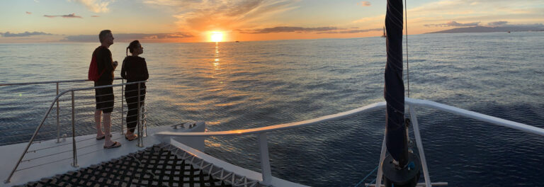 Watching the sunset aboard the Makani Catamaran